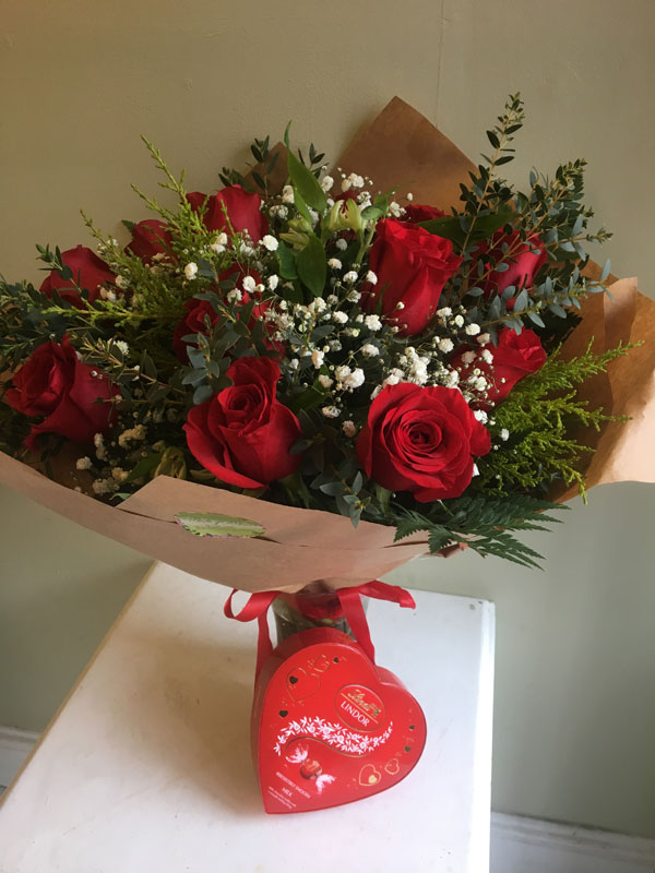 Valentines Dozen Red Roses In Vase With Chocolates Shades Of Bloom